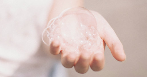 mage of a hand holding a Gentle Cleansers for All Skin Types